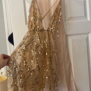Women’s sparkly dress with sheer shorts under (romper style)
